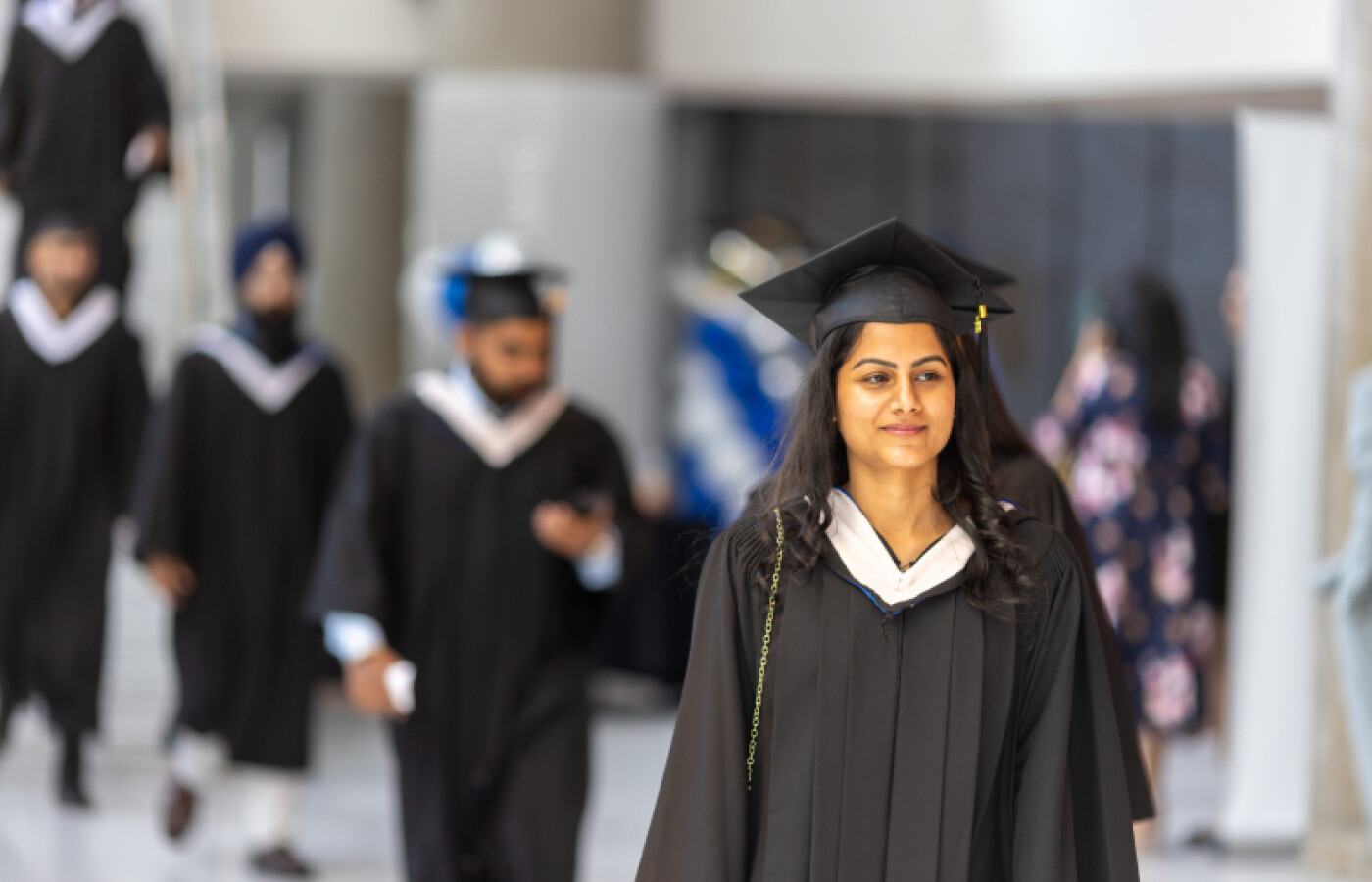 Graduates walking in a line